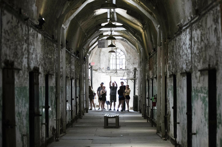 AP19122682432257 Tourist visit a cellblock of the Eastern State Penitentiary, Thursday, May 2, 2019, which is now a museum in Philadelphia. (AP Photo/Matt Rourke)