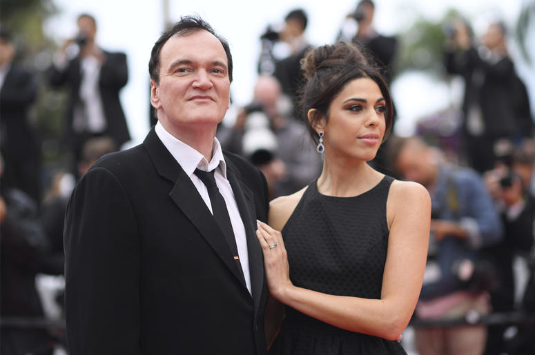 AP19138567488135 Film director Quentin Tarantino and his wife Daniela Pick pose for photographers upon arrival at the premiere of the film 'The Wild Goose Lake' at the 72nd international film festival, Cannes, southern France, Saturday, May 18, 2019. (Photo by Arthur Mola