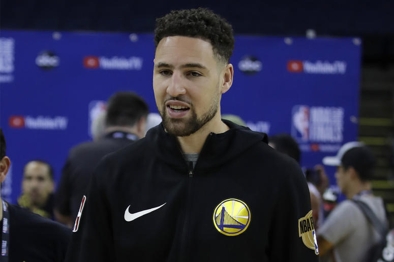 AP19157723091036 Golden State Warriors' Klay Thompson walks off the court after practice for the NBA Finals against the Toronto Raptors Thursday, June 6, 2019, in Oakland, California. (AP Photo/Ben Margot)
