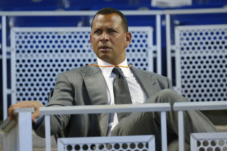 AP19175228518605 In this June 23, 2017, file photo, former baseball player Alex Rodriguez sits in the stands before the start of a baseball game in Miami. (AP Photo/Wilfredo Lee, File)