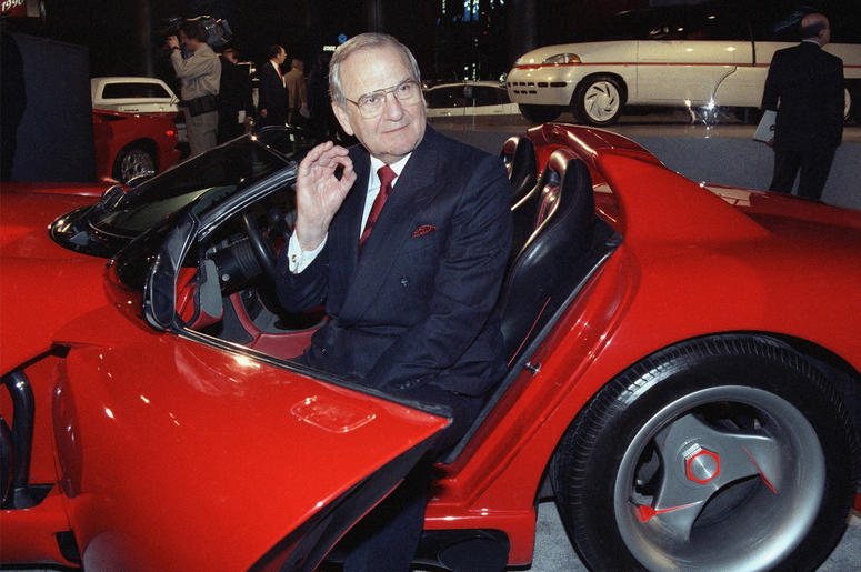 AP19184047394114 In this March 28, 1990, file photo, Chrysler Corporation Chairman Lee Iacocca sits in a 1990 Dodge Viper sports car as the Chrysler in the 90's six city tour makes a visit to New York. (AP Photo/Osamu Honda, File)