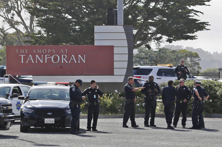 AP19184055187305 Police investigate at the scene of a shooting at the Tanforan Mall in San Bruno, Calif., Tuesday, July 2, 2019. (AP Photo/Stephanie Mullen)