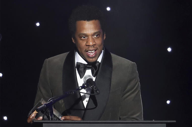 AP19186586768342 In this Jan. 27, 2018, file photo, honoree Jay-Z speaks onstage at the 2018 Pre-Grammy Gala And Salute To Industry Icons at the Sheraton New York Times Square Hotel in New York. (Photo by Michael Zorn/Invision/AP, File)