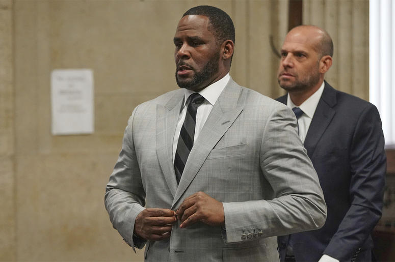 AP19197693163230 In this June 6, 2019, file photo, singer R. Kelly pleaded not guilty to 11 additional sex-related felonies during a court hearing before Judge Lawrence Flood at Leighton Criminal Court Building in Chicago. (E. Jason Wambsgans/Chicago Tribune via AP, Pool)