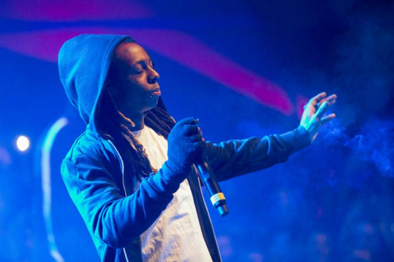 Lil Wayne performs during the Maxim Party on Treasure Island. Lil Wayne performs during the Maxim Party on Treasure Island.