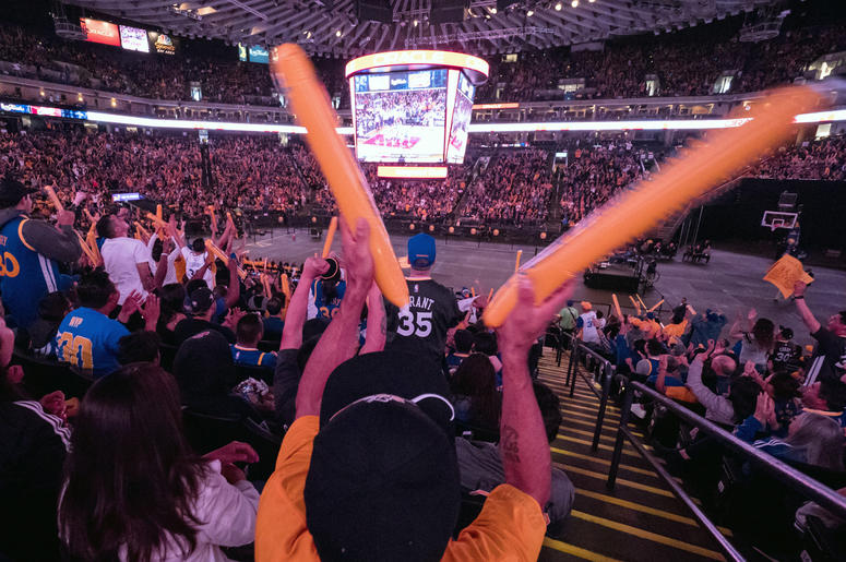 Golden State Warriors Watch Party at Oracle Arena A Golden State Warriors fan waves thunder sticks during a watch party for game four of the 2017 NBA Finals against the Cleveland Cavaliers at Oracle Arena. Mandatory Credit: Kelley L Cox-USA TODAY Sports