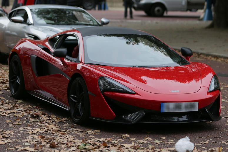 McLaren sports car 9/24/2016 - A McLaren (front in red) sports car during filming of the film Transformers: The Last Knight, on The Mall in London. (Photo by PA Images/Sipa USA)