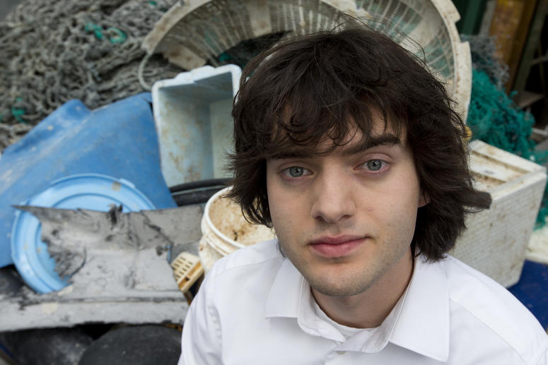 7494ac12b30640c081f6a429e234b086 In this May 11, 2017, file photo, Dutch innovator Boyan Slat poses for a portrait next to a pile of plastic garbage prior to a press conference in Utrecht, Netherlands. Engineers will deploy a trash collection device to corral plastic litter floating betw