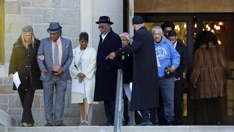 AP19084652007502 Family members of the late Aretha Franklin gather before entering the Mausoleum Chapel at the Woodlawn Cemetery, Monday, March 25, 2019, in Detroit. (AP Photo/Carlos Osorio)