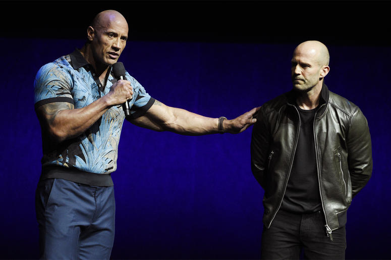 AP19093722356462 Dwayne Johnson, left, and Jason Statham, cast members in the upcoming film "Fast and Furious Presents: Hobbs & Shaw," appear during the Universal Pictures presentation at CinemaCon 2019, the official convention of the National Association of Theatre Owner