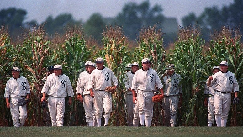 AP19220556962495 In this July 22, 1977, file photo, people portraying ghost players emerge from a cornfield as they reenact a scene from the movie "Field of Dreams" at the movie site in Dyersville, Iowa. The Chicago White Sox will play a game against the New York Yankees
