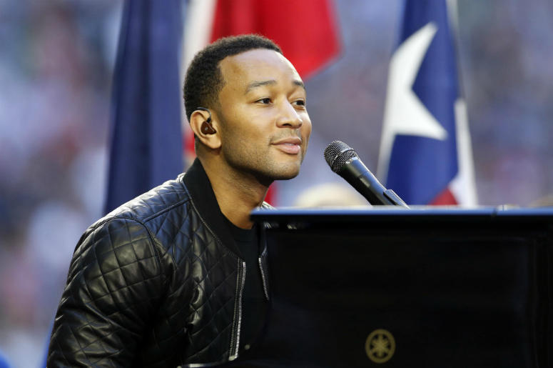 John Legend performs before Super Bowl XLIX between the New England Patriots and the Seattle Seahawks at University of Phoenix Stadium. John Legend performs before Super Bowl XLIX between the New England Patriots and the Seattle Seahawks at University of Phoenix Stadium.