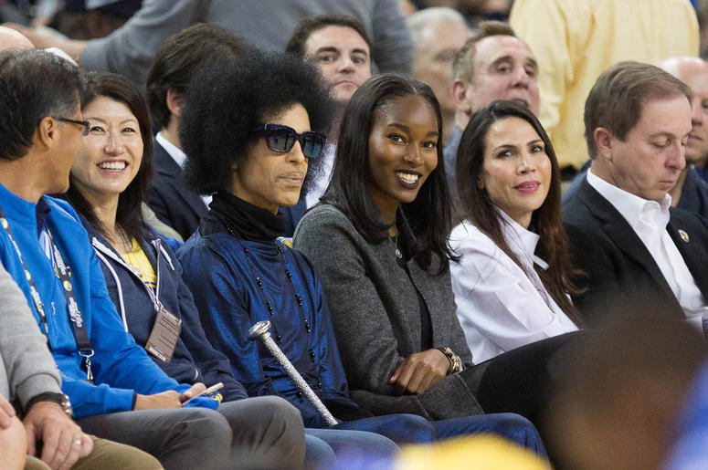 Prince at Oracle Arena watching the Golden State Warriors Prince at Oracle Arena watching the Golden State Warriors Mar 3, 2016; Oakland, CA, USA; Recording artist Prince sits on the sidelines during the second quarter between the Golden State Warriors and the Oklaho (Photo credit: Kelley L Cox-USA TODAY Sports)