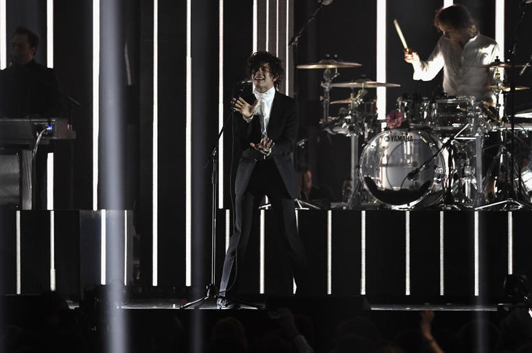 Matthew Healy performs with The 1975 on stage at The BRIT Awards 2017 Matthew Healy performs with The 1975 on stage at The BRIT Awards 2017
