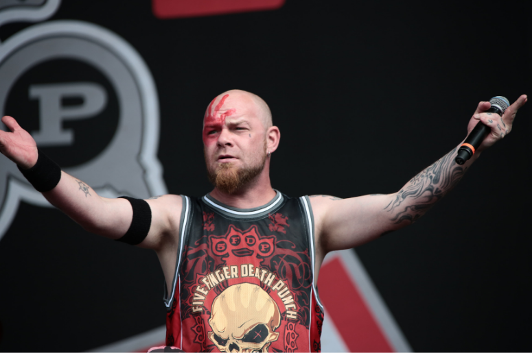 Ivan Moody of Five Finger Death Punch performing on the main stage on day 3 of the 2016 Reading Festival Ivan Moody of Five Finger Death Punch performing on the main stage on day 3 of the 2016 Reading Festival