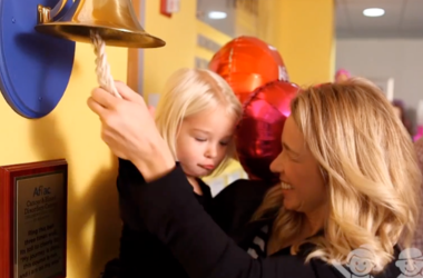 Jenn Hobby and Reese ring the bell Jenn Hobby and Reese ring the bell