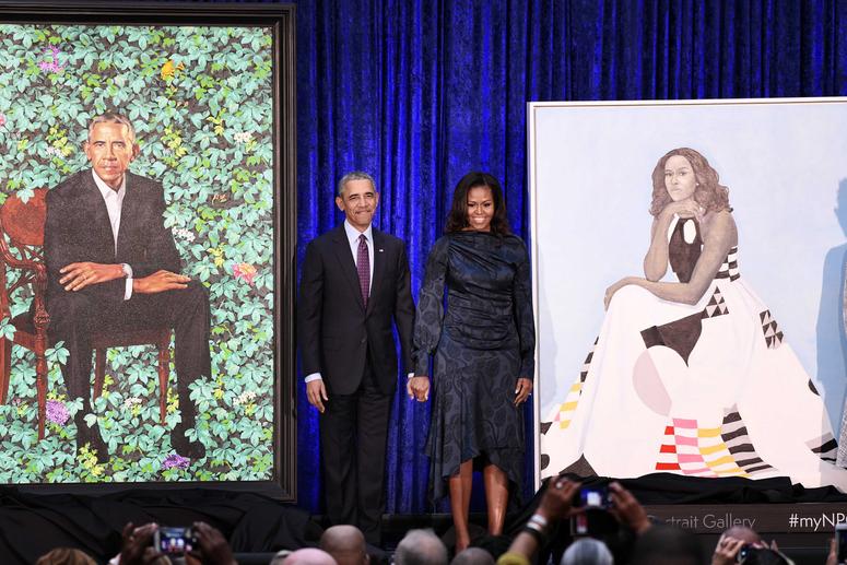 February 12, 2018 ; Washington, DC, USA; Former President Barack Obama and First Lady Michelle Obama pose next to their official portraits at the National Portrait Gallery at the National Portrait Gallery in Washington, DC.