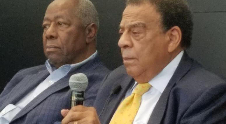 Civil Rights legend Andrew Young (r) is shown with homerun great and businessman Hank Aaron in a 2016 photo.
