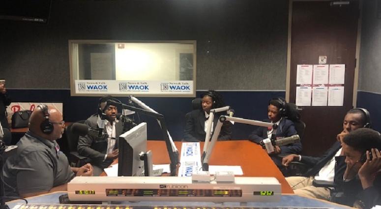 Derrick Boazman with Harvard Diversity Project Debate Team inside the WAOK Studio in Atlanta, Ga 7/17/19 Derrick Boazman with Harvard Diversity Project Debate Team