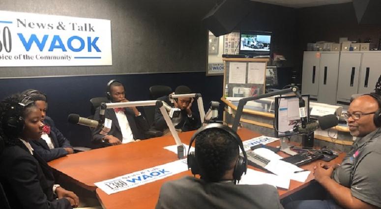 Derrick Boazman with Harvard Diversity Project Debate Team inside the WAOK Studio in Atlanta, Ga 7/17/19 Derrick Boazman with Harvard Diversity Project Debate Team