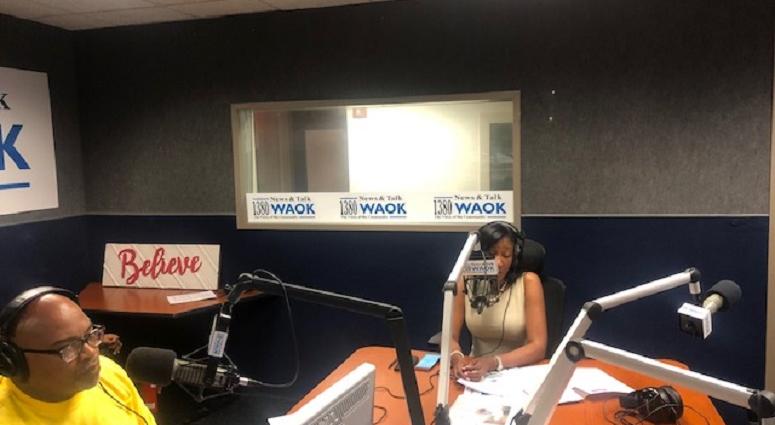 Derrick Boazman with Fulton County Commissioner Natalie Hall in WAOK Studios 9/30/19 Derrick Boazman with Fulton County Commissioner Natalie Hall