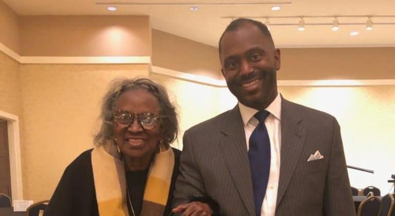 Mrs. Juanita Abernathy is escorted by her son Kwame during a Black History program in February 2019 Mrs. Juanita Abernathy is escorted by her son Kwame during a Black History program in February 2019
