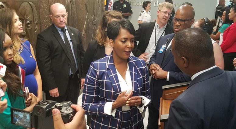 Atlanta Mayor Keisha Lance Bottoms speaks with reporters following Thursday news conference about her Executive Order on immigration