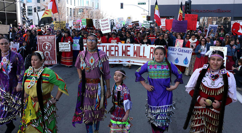 Native Americans lead the march down Virginia Street as thousands take part in the Women's March in Reno. Native Americans lead the march down Virginia Street as thousands take part in the Women's March in Reno.