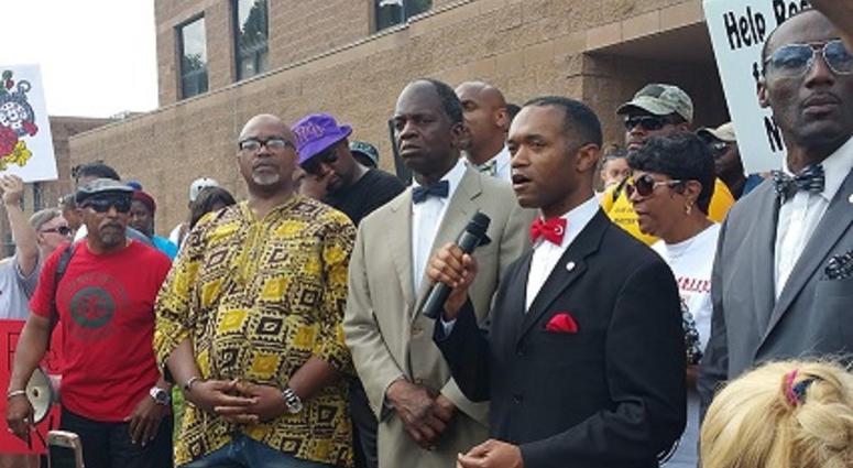 Members of the Nation of Islam joined many others at the rally outside the Rockdale County jail Saturday.