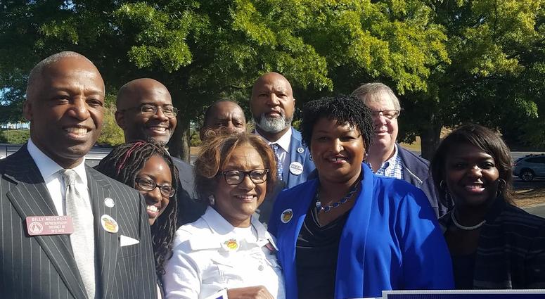 Democratic Gubernatorial Candidate Stacey Abrams is joined by politicians and other supporters after she cast her ballot Democratic Gubernatorial Candidate Stacey Abrams is joined by politicians and other supporters after she cast her ballot