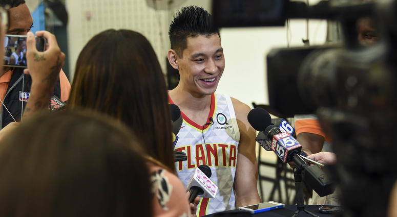 Atlanta Hawks player Jeremy Lin (7) is shown being interviewed during Hawks Media Day at the Emory Sports Medicine Complex.