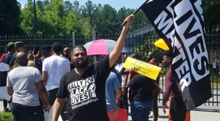 Members of various groups held a news conference and then marched to the Waffle House headquarters in metro Atlanta Friday.