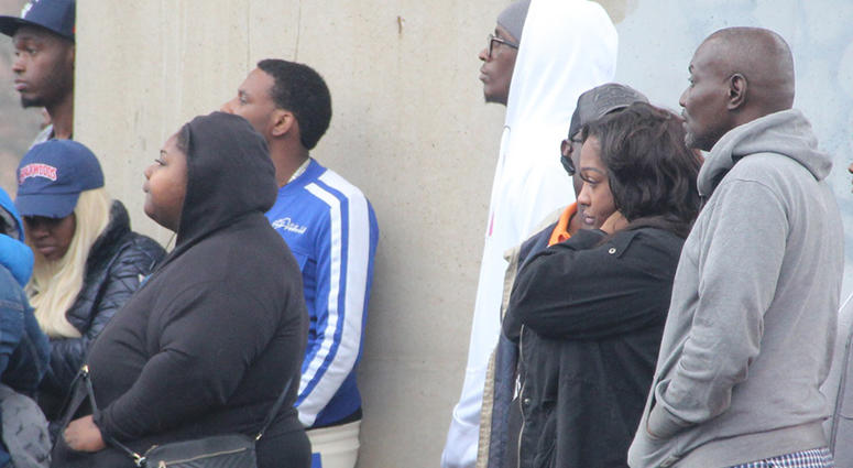 Rapper Young Thug (white hoodie) is spotted at the scene of a double deadly shooting in southwest Atlanta Rapper Young Thug (white hoodie) is spotted at the scene of a double deadly shooting in southwest Atlanta