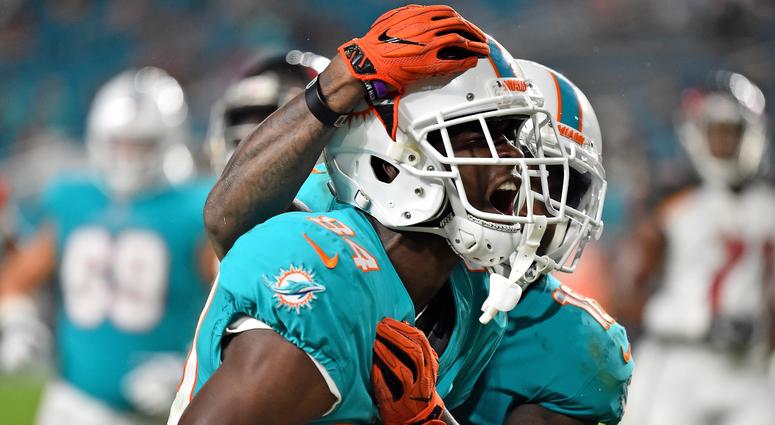 Miami Dolphins wide receiver Isaiah Ford (84) celebrates his touchdown during the second half against the Tampa Bay Buccaneers at Hard Rock Stadium. Miami Dolphins wide receiver Isaiah Ford (84) celebrates his touchdown during the second half against the Tampa Bay Buccaneers at Hard Rock Stadium.
