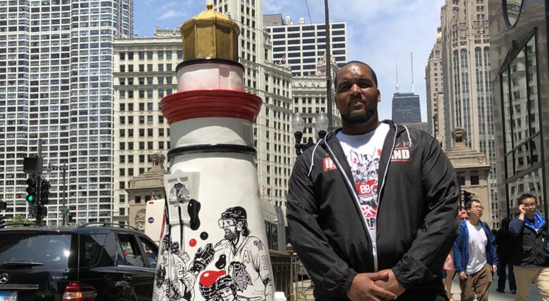 Hamza Muhammad, with lighthouse "Lift Us"