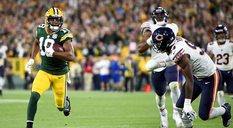 Packers receiver Randall Cobb scores the winning touchdown against the Bears. Packers receiver Randall Cobb scores the winning touchdown against the Bears.