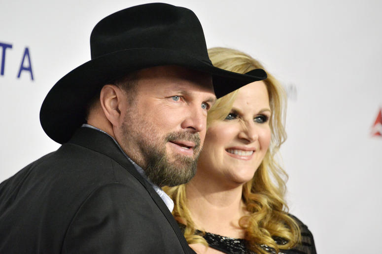 Garth Brooks and Trisha Yearwood at the 2019 MusiCares Person Of The Year Honoring Dolly Parton held at the Los Angeles Convention Center in Los Angeles, CA Garth Brooks and Trisha Yearwood at the 2019 MusiCares Person Of The Year Honoring Dolly Parton held at the Los Angeles Convention Center in Los Angeles, CA