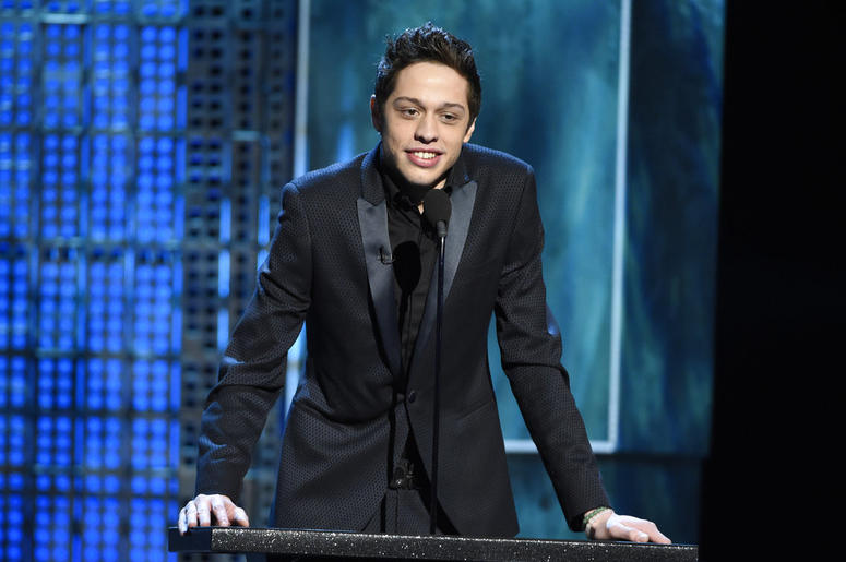 Pete Davidson speaks at a Comedy Central Roast at Sony Pictures Studios in Culver City, Calif. Davidson is breaking his silence in an Instagram post following the short-lived engagement with Ariana Grande. Davidson says he’s been getting bullied online an DO NOT USE