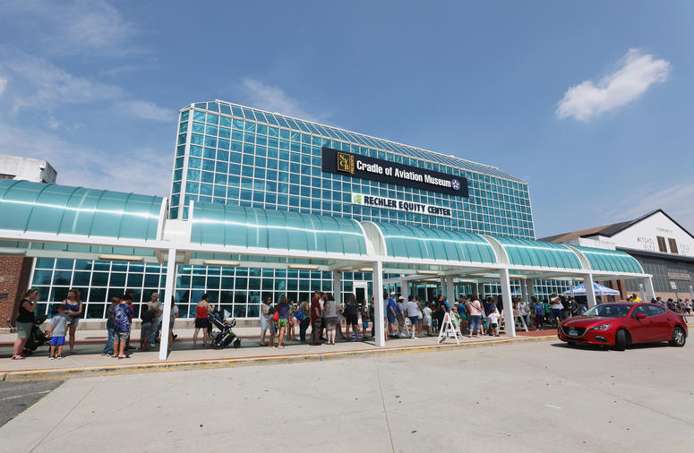 Spectators in line at the aviation museum. Spectators in line at the aviation museum.