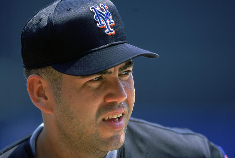 Edgardo Alfonzo #13 of the New York Mets looks on during the game against the Pittsburgh Pirates at Shea Stadium in Flushing. Edgardo Alfonzo
