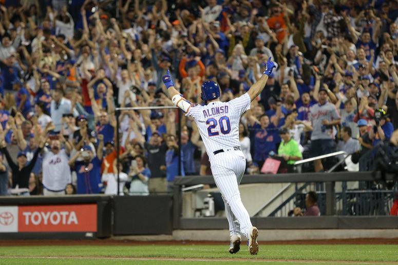 New York City, NY, USA; New York Mets first baseman Pete Alonso (20) rounds the bases after hitting a solo home run against the Atlanta Braves during the third inning at Citi Field. Pete Alonso