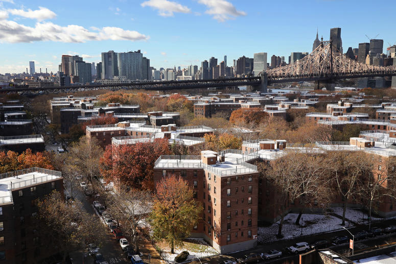 The Queensbridge Houses sit beneath the Ed Koch Queensboro Bridge, upper right, Friday, Nov. 16, 2018, in New York. Amazon LIC Headquarters