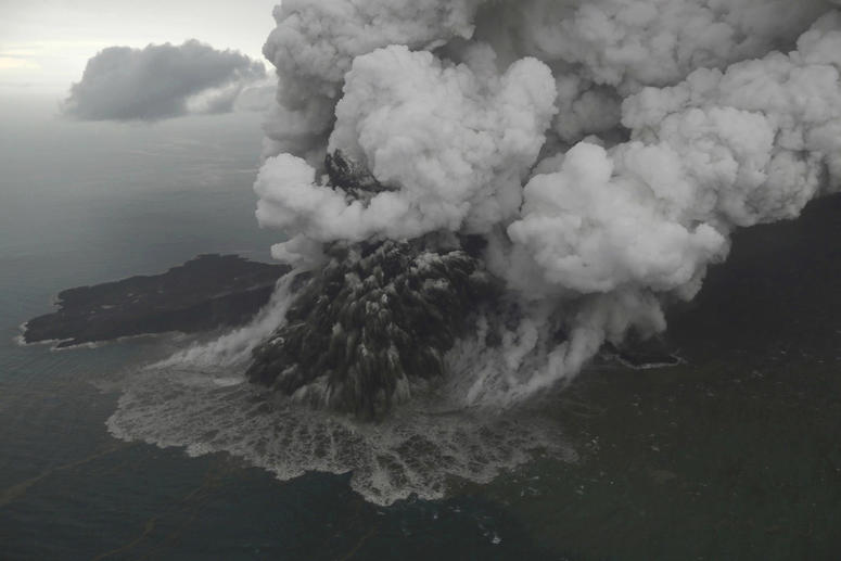 This aerial shot taken on Sunday, Dec. 23, 2018 shows Mount Anak Krakatau as it erupts on Java Strait, Indonesia. Indonesia Tsunami