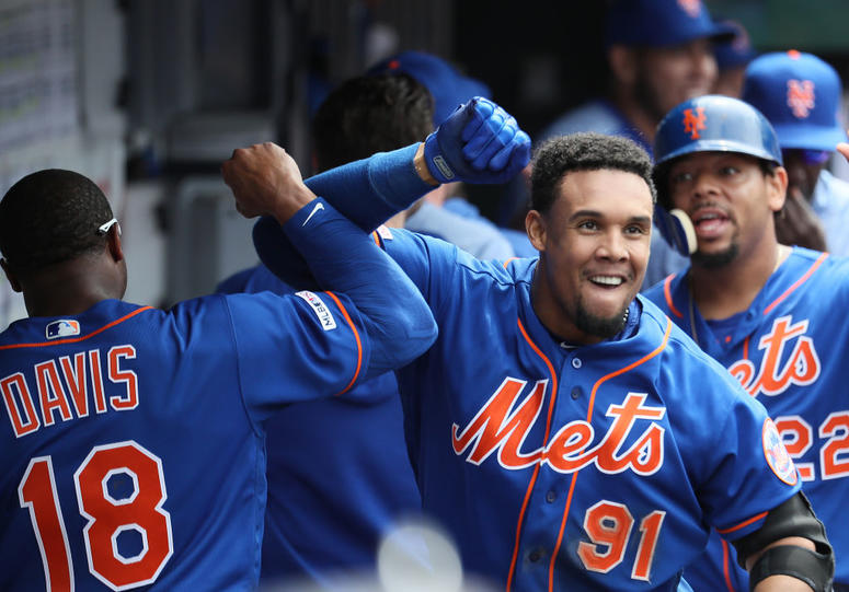 Carlos Gomez #91 of the New York Mets celebrates after hitting a three run home run in the eighth inning against the Washington Nationals during their game at Citi Field on May 23, 2019. Carlos Gomez