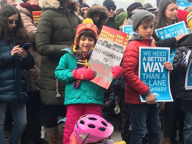 Residents protest the BQE plan at the promenade. BQE DOT protest