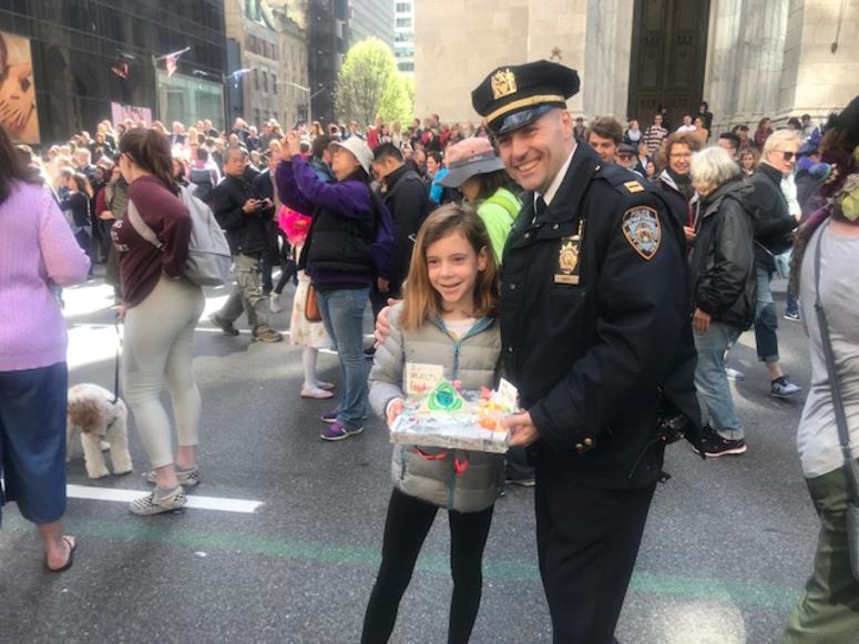 An officer with a girl at the Easter Parade. Easter Sunday