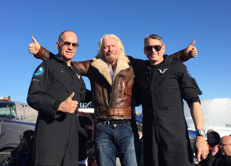Sir Richard Branson with pilots Frederick Sturckow (left) and Mark Stucky (right) ahead of the Virgin Galactic test flight of SpaceShipTwo, VSS Unity, which took off in the early morning sunshine at the Mojave test centre in California on Thursday. Virgin Galactic