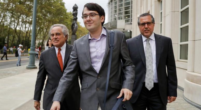 In this Thursday, July 27, 2017, file photo, Martin Shkreli, center, leaves federal court with his attorney Benjamin Brafman, left, in New York. Martin Shkreli
