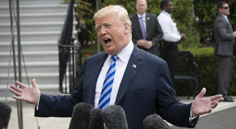 President Donald Trump talks to the media as he leaves for Dallas to address the National Rifle Association, Friday, May 4, 2018 at the White House in Washington. Donald Trump