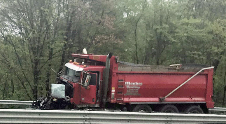 A dump truck sits near the scene after a collision with a school bus in Mount Olive, N.J., Thursday, May 17, 2018. Deadly New Jersey School Bus Crash